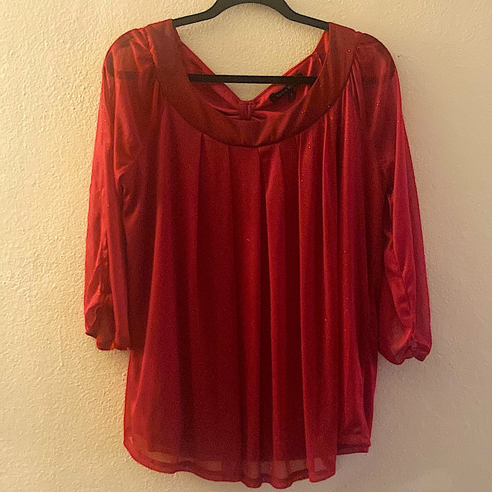 Red blouse with sheer overlay